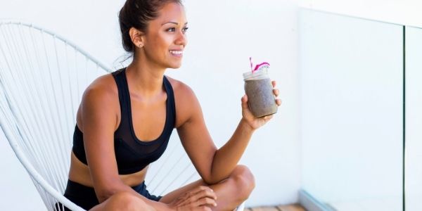lady drinking a smoothie