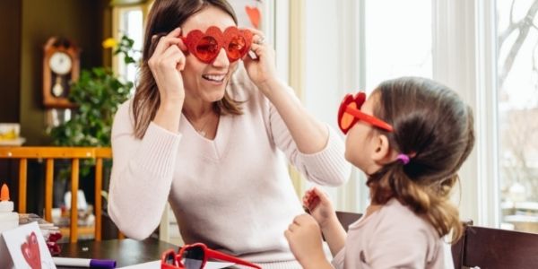 mom and daughter doing crafts together