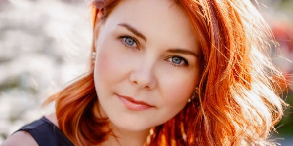 close up of lady with very red hair