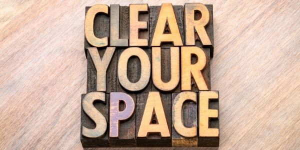 words clear your space carved out n wood