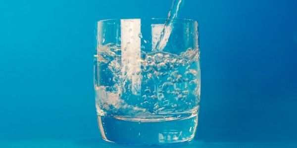 glass being filled with water