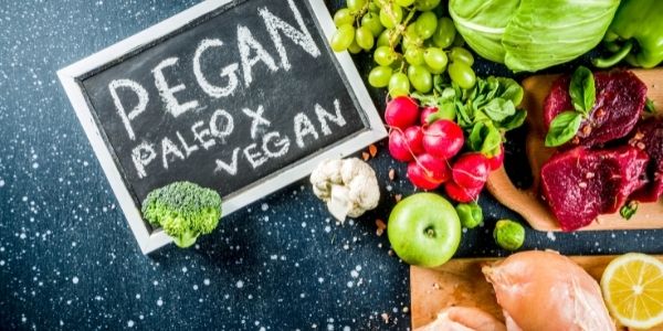 chalk board that says pegan paleo x vegan