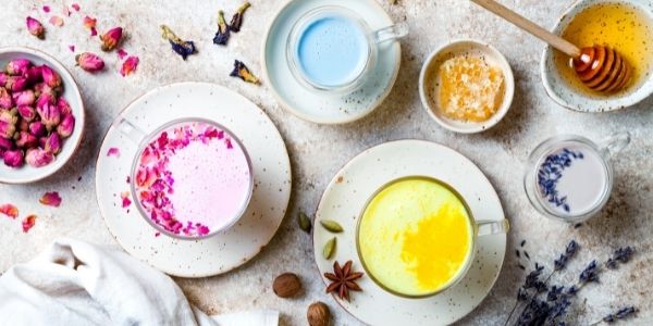 4 moon milk drinks on a table