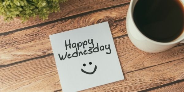 note saying happy wednesday with coffee cup beside it